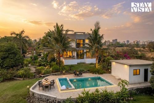StayVista at The Green Courtyard with Pool and BBQ