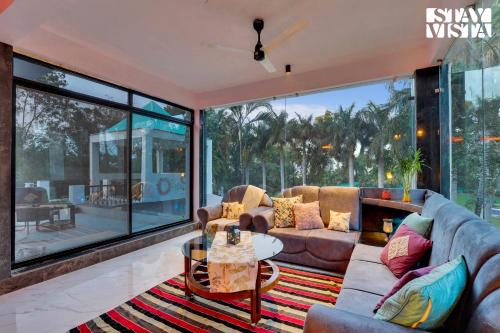 StayVista's Palm Perle Villa - Pet-Friendly Retreat with Terrace & Lawn