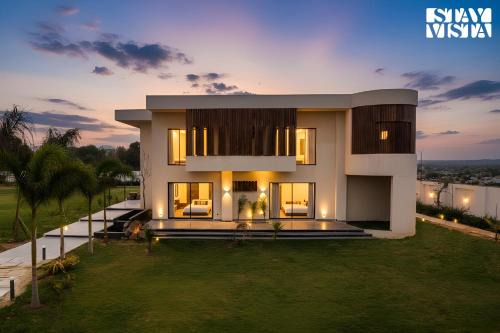 StayVista's The Sweet Life - Luxury Farm stay with Private Pool & Fireplace