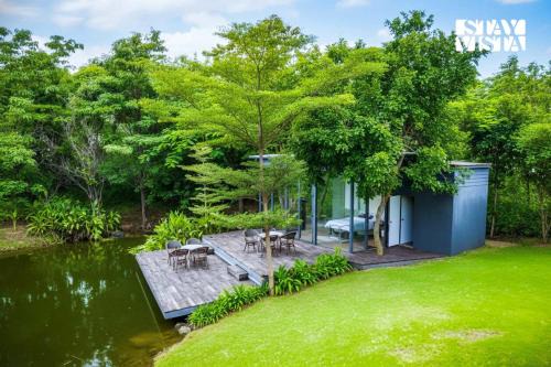 StayVista's Water Song Garden - Lake-Side, Pet-Friendly Villa with Bar, Spacious Lawn & Indoor-Outdoor Games