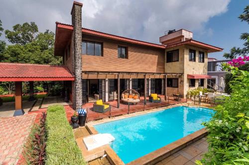 StayVista's Woodstone Villa - Heated Pool & Activities