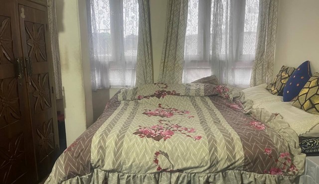 The apartment is a 2 bedroom, 1 living room, 1 bathroom with kitchen.