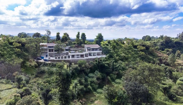 The Blue Door - A Rustic Art Deco Boutique Villa with stunning views