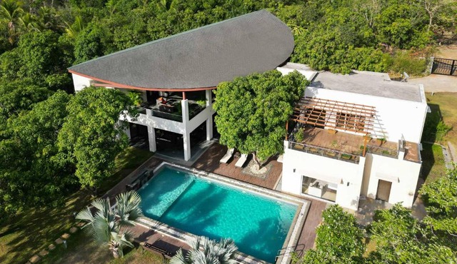 The Leaf by StayVista - An enchanting escape offering a pool, terrace, lush lawn, contemporary interiors, and indoor games