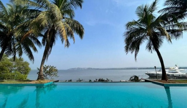 The Postcard on The Mandovi River