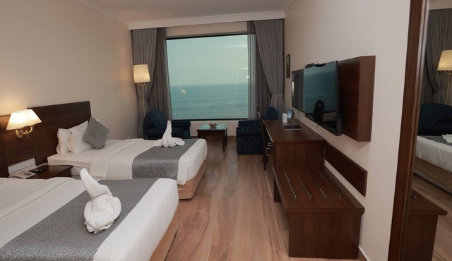 The Quilon Beach Hotel and Convention Center