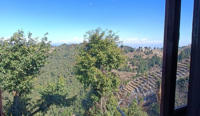 top of the mountain surrounding with nature view and snow caped mountains view f