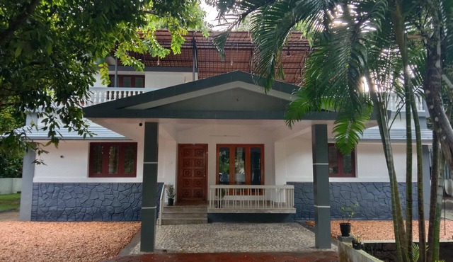 Tranquil Villa by River Peaceful stay by Homeyhuts