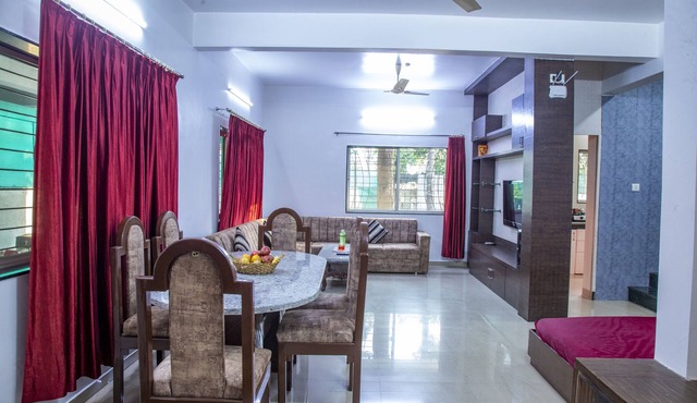 Your private oasis awaits - a 4 BHK villa with a pool near the city."