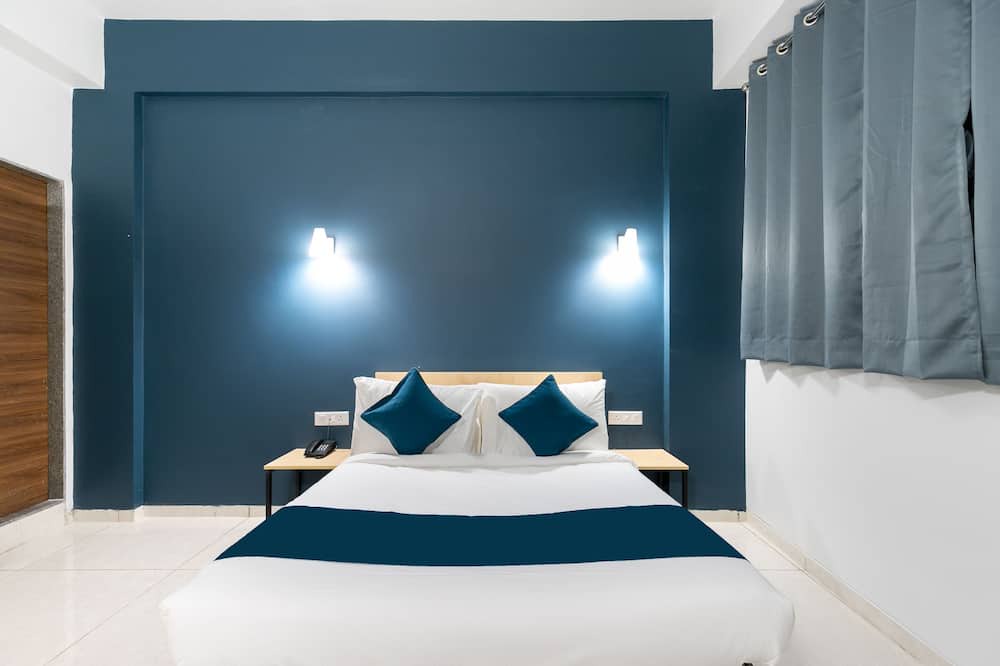 Tirupur Hotel | Capital O New Paradise Inn