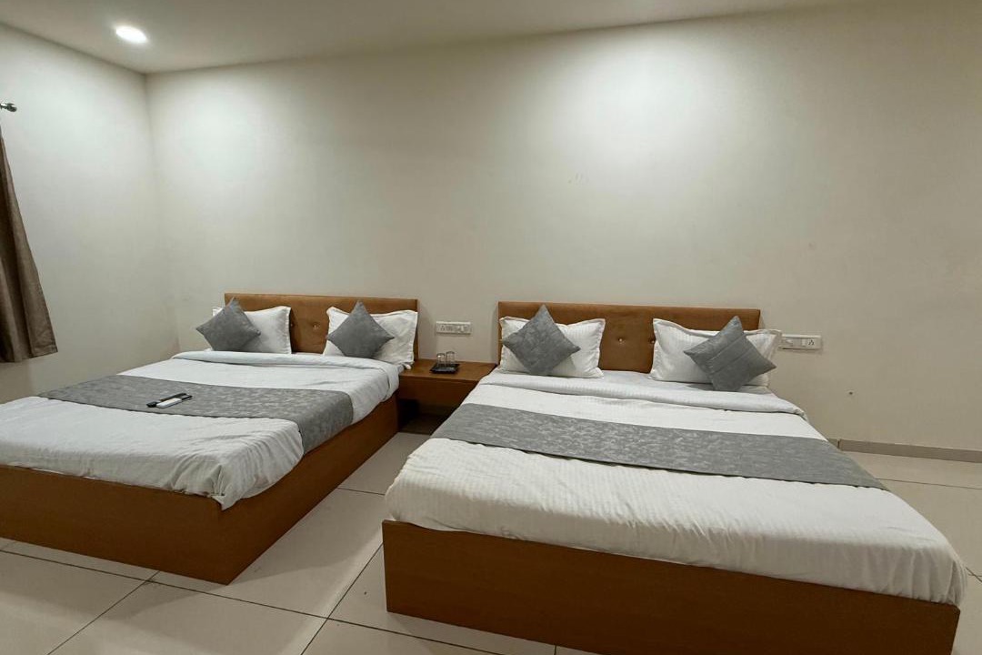 Ambav Hotel | Hotel Marigold Vasad