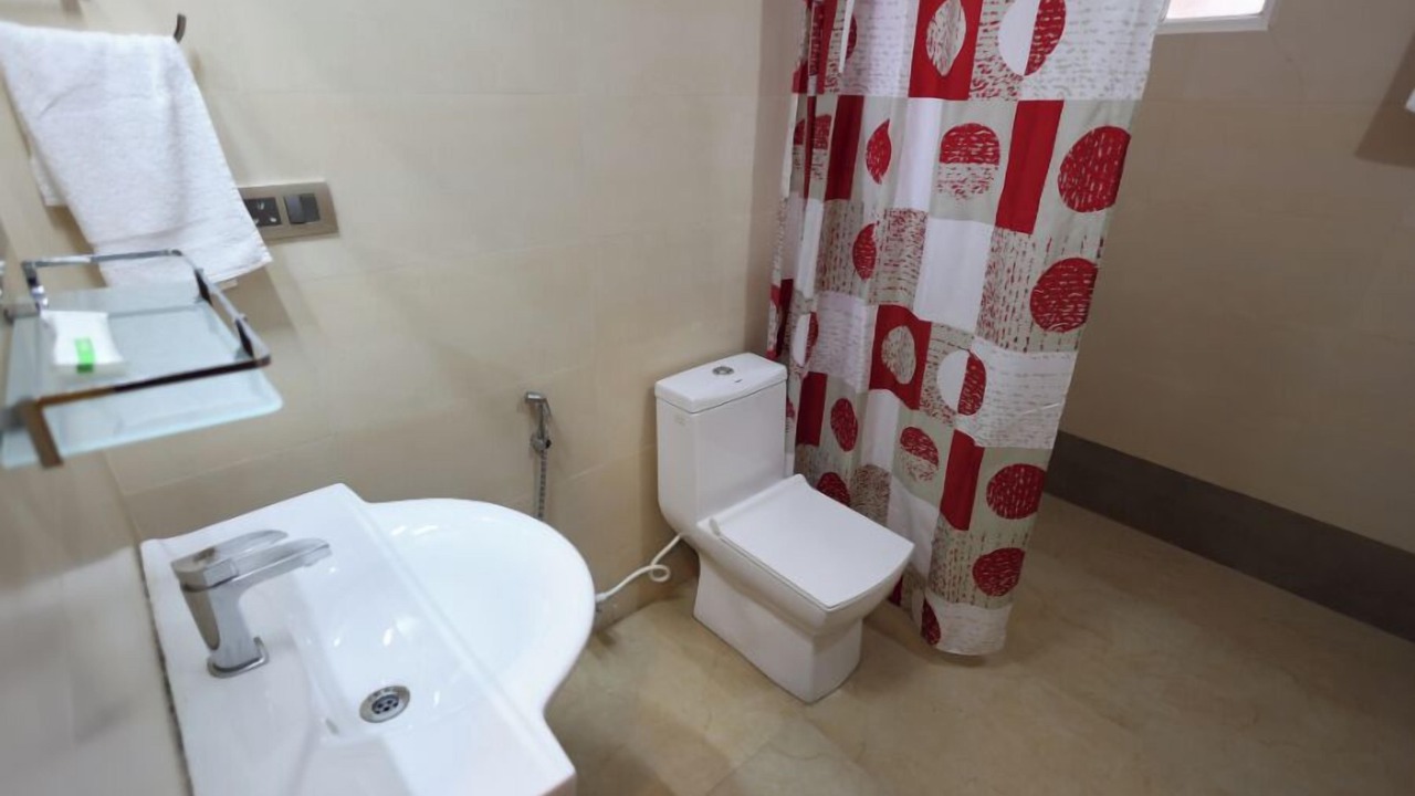Photo of Bathroom in Pudumund