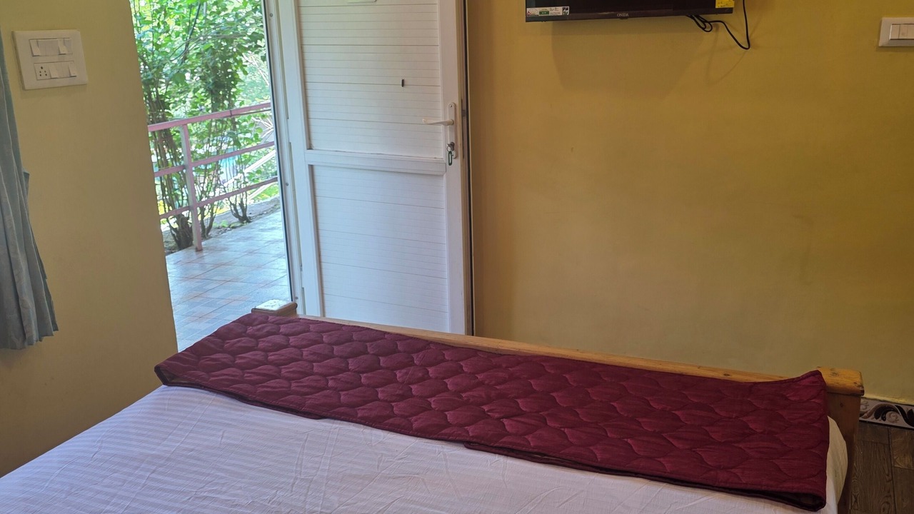 Photo of Bedroom in Valparai