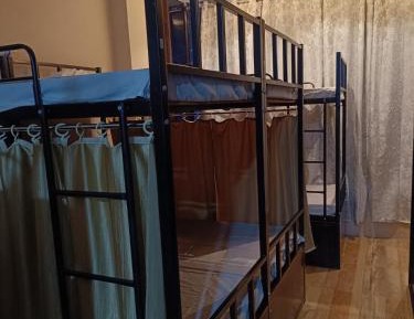Single Bed in Dormitory Room