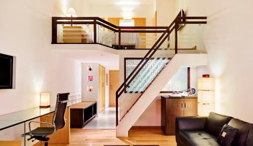 Duplex Suite, Club level, 1 Bedroom Bi-level Suite, 1 King, City view, Balcony with 10% F & B discount