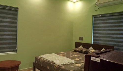 Deluxe Room (2 Adults + 1 Child)