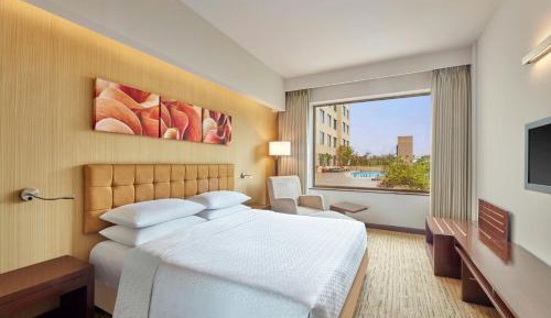 650 sqft Bedroom Apartment with Kitchenette with 30% discount on Food & Soft Beverages and Complimentary Lounge Access with 2 IMFL drinks & snack buffet during 1800 to 2000 hrs