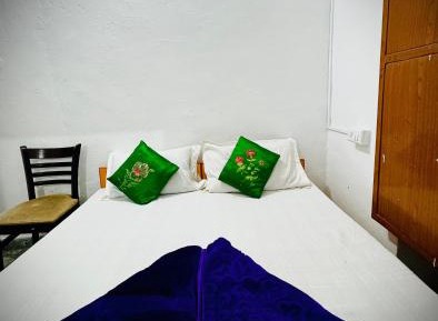 Economy Quadruple Room with Shared Bathroom