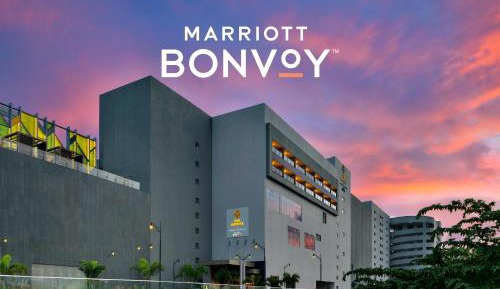 Standard Twin Room with Balcony – Spacious 538 Square Feet Room with Happy Hours from 11 AM to 6.30 PM