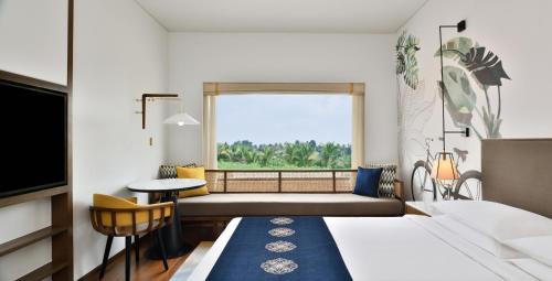 Deluxe King Room, Complimentary Airport Transfers and Tea Tales with Lila from 5pm to 6pm.2 Way Airport Transfers Buy one drink, get a second free with our Happy Hour offer