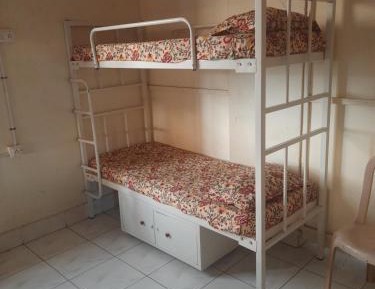 Single Bed in Male Dormitory Room