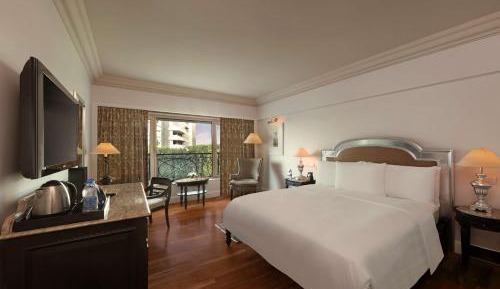 Deluxe King Guestroom with Happy Hours 1+1 offer at Lounge Bar , 20% off on Food & Beverages and Spa