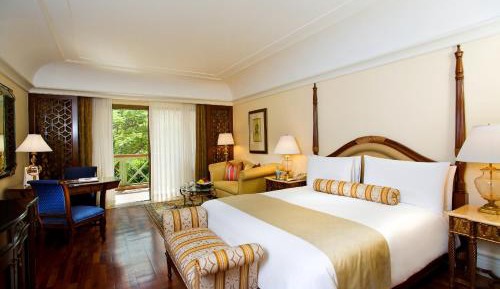 Deluxe Room with Balcony overlooking the Poolside / Garden
