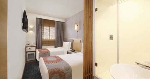 Standard Twin Room with Complimentary Early Check-in from 1:00 pm & Late check out by 2 pm (subject to availability) & Avail 10% discount on laundry services