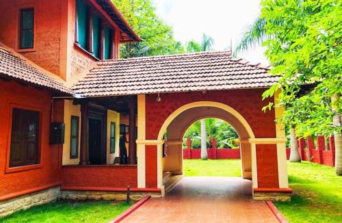 Ramanagara Villa | Ambara Kovilakam Private Pool Villa by Travent Mug