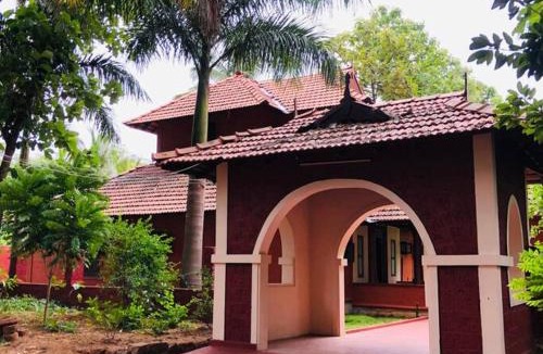 Ramanagara Villa | Ambara Kovilakam Private Pool Villa by Travent Mug