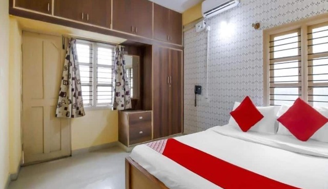 Spacious Bedroom hotel with AC and Free Wi-Fi in vibrant Bengaluru